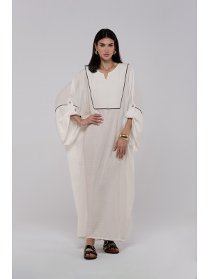 Long white linen kaftan with an elegant pattern