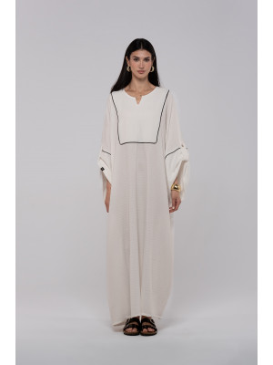 Long white linen kaftan with an elegant pattern Long white linen kaftan with an elegant pattern