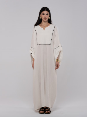 Long white linen kaftan with an elegant pattern