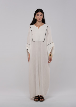 Long white linen kaftan with an elegant pattern